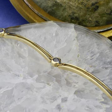 8 karaat fantasie schakelarmband met tanzaniet, Gebruikt, Geel, Ophalen of Verzenden, Met edelsteen