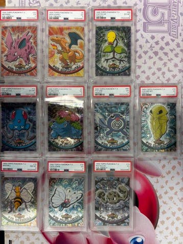 Pokémon - 10 Graded card - Charizard, Nidorino, Tentacool,, Nieuw