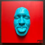 gregos - Blue light mockery on red background