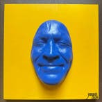 gregos - Blue smile on yellow background