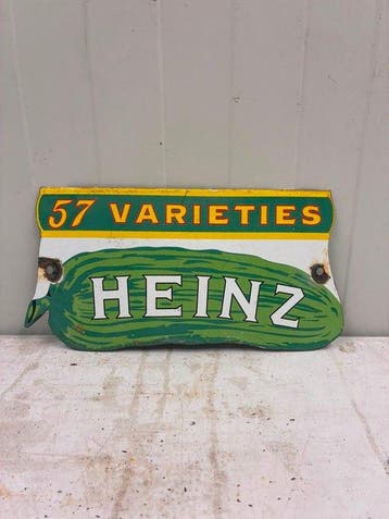 Vintage Heinz “57 Varieties” reclamebord – augurk vorm