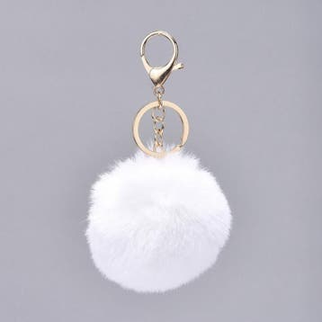 Super zachte fluffy sleutelhanger licht goudkleur c.a. 13..., Ophalen of Verzenden, Nieuw, Bedel
