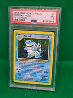 Pokémon - 1 Graded card - Pokémon - Turtok #2 First edition,, Hobby en Vrije tijd, Verzamelkaartspellen | Pokémon, Nieuw