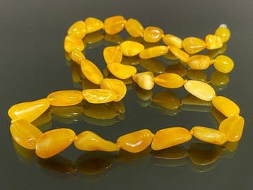 Gouden butterscotch en zeldzaam eidooierkleurig natuurlijke