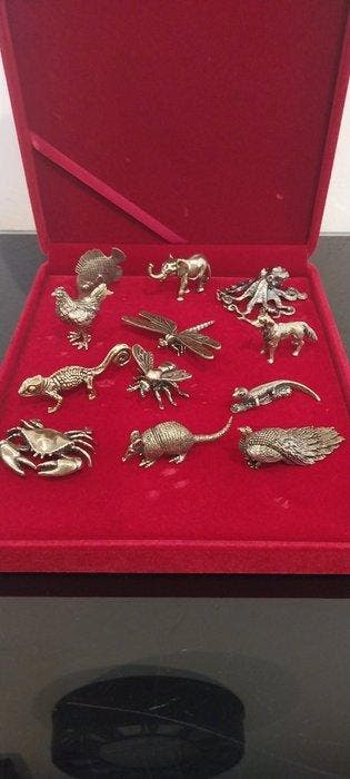 Messensteun (12) - animaux exotiques - Verguld messing, Antiek en Kunst
