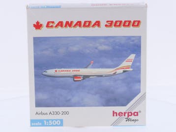 Schaal 1:500 Herpa 508360 Canada 3000 Airbus A330-200 Reg..., Hobby en Vrije tijd, Ophalen of Verzenden, Zo goed als nieuw