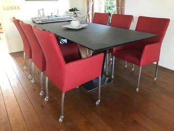 Set van 6 leren eetkamerstoelen met wieltjes en armleuning, Huis en Inrichting, Stoelen, Ophalen of Verzenden, Nieuw, Leer