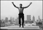 Thomas Höpker - Muhammad Ali jumping from a bridge over the