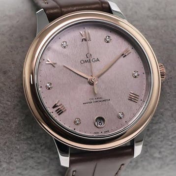 OMEGA - 34 mm, stainless steel and 18K Sedna gold on a, Nieuw