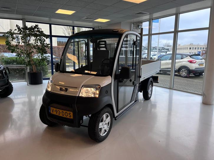 Elektrische bedrijfswagen met kieper demo unit Club Car, Auto's, Bestelauto's, Origineel Nederlands, Dealer onderhouden, Automaat