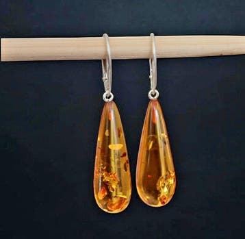 Zonder reserve. Oorbellen van Baltische amber en zilver 925., Antiek en Kunst