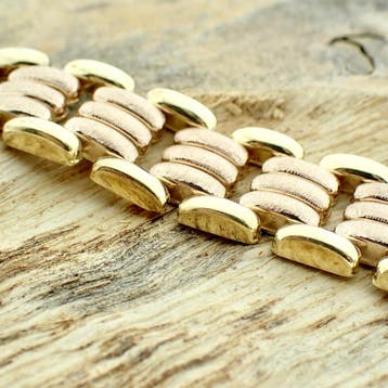 Vintage bicolor gouden brede schakelarmband, Ophalen of Verzenden, Gebruikt, Goud, Goud