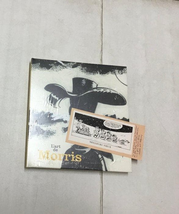 Lucky Luke Lart de Morris + carte de voeux signée par, Boeken, Stripboeken
