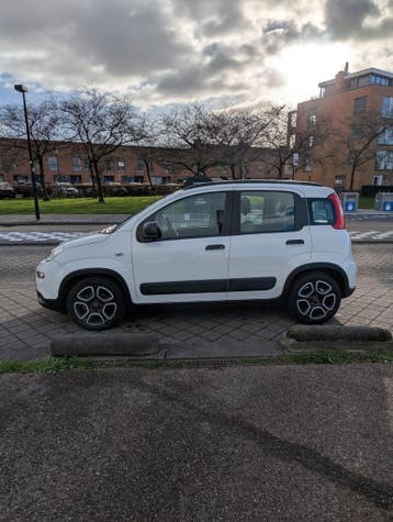 Fiat Panda 1.0 70pk Hybrid 2022 Wit, Auto's, Voorwielaandrijving, Dealer onderhouden, Stof, Gebruikt