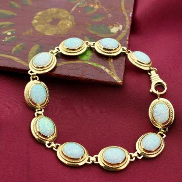 Gouden armband met opaal (Schakelarmband), Gebruikt, Ophalen of Verzenden, Met edelsteen, Goud